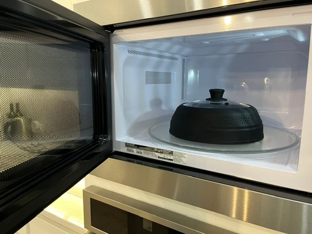 After cleaning: Clean and polished microwave interior