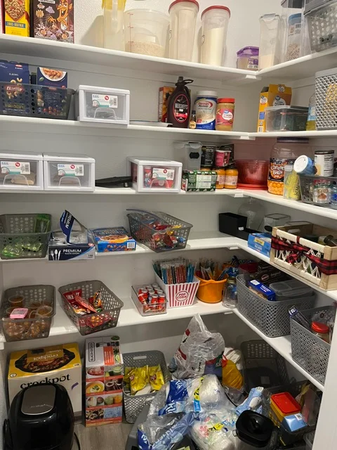 Before cleaning: Messy pantry with scattered items
